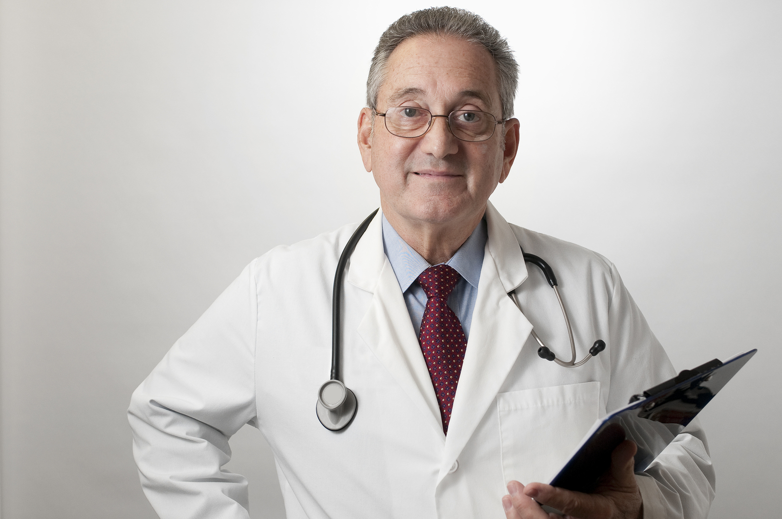 Hispanic Doctor Physician With Clipboard - Florida Medical Clinic ...