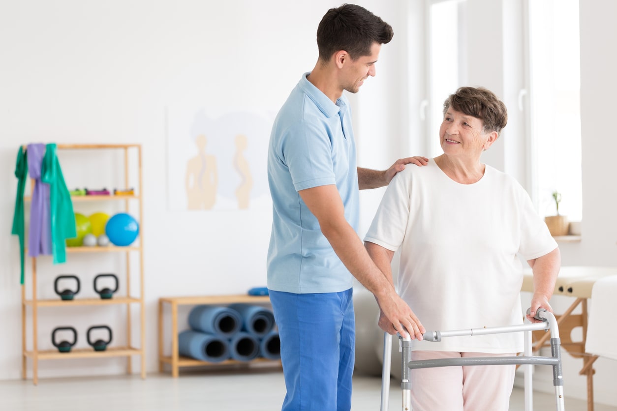 Physical therapist with patient